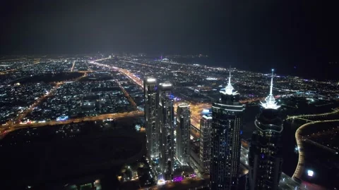 Flying a drone over a night Dubai. Aerial view Vídeos de archivo 209169142