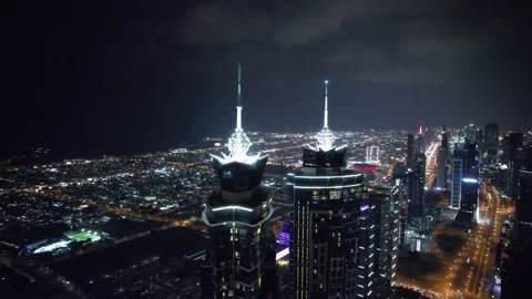 Flying a drone over a night Dubai. Aerial view Stock Footage 227475342