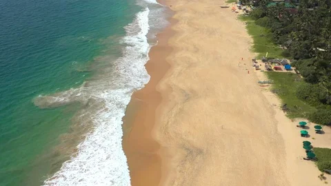 Flying on a drone over the ocean at dawn. Sunny weather. Sri Lanka Stock Footage 104691956