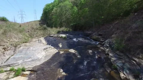 Flying the Drone Over the Stream Vídeos de archivo 63194340