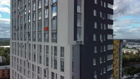 Flying a drone over a tall building. Stock Footage 218705672