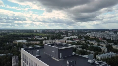 Flying a drone over a tall building. Stock Footage 218705820