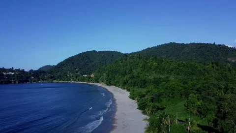 Flying drone over the waters of beautiful Las Cuevas beach in Trinidad. 스톡 동영상 249230182