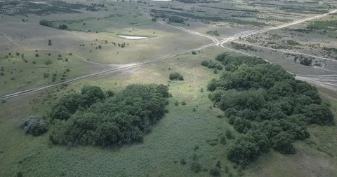 Flying a drone over the wild forests on the island Stock Footage 117990482