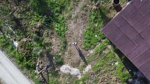  flying drone by the shed Stock Footage 321781458