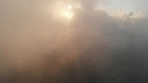Flying drone through the clouds over the slopes of Mount Carmel, Israel. 库存影片 113318189