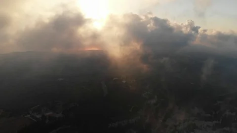 Flying drone through the clouds over the slopes of Mount Carmel, Israel. Video stock 113318580