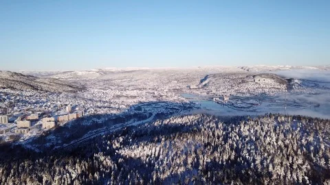 Flying drone towards Drammen above the hill in Norway 스톡 동영상 85819924