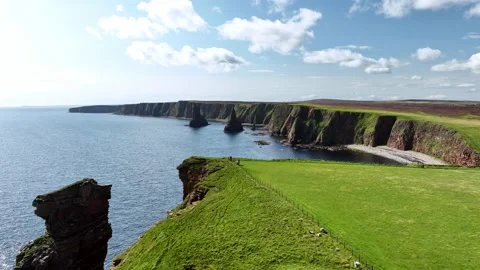 Flying a drone towards Duncansby Stacks in northern Scotland. Stock Footage 260606502