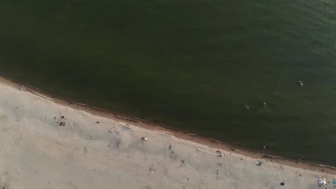 Flying a drone with a view of the sea and the beach against the blue sky. Stock Footage 133762888