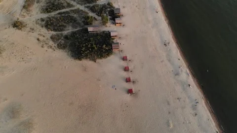 Flying a drone with a view of the sea and the beach against the blue sky. Stock Footage 133762909