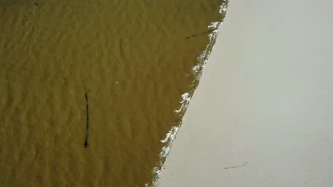 Flying a drone with a view of the sea and the beach against the blue sky. Stock Footage 133763253