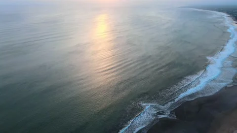 Flying Drone Of Waves Crushing On Beach Landscape on The Sunset on Bali Vídeos de archivo 133629501