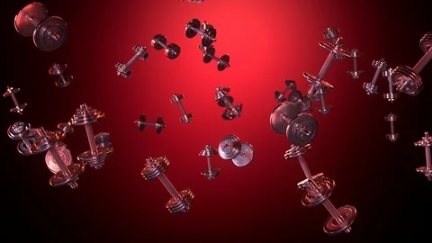 Flying dumbbells in red lighting. Red background. Stock Footage 112074825