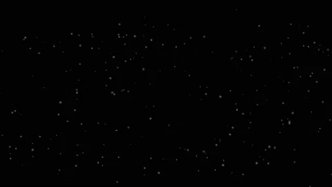 Flying dust particles on a black background. Light Suspension Stock Footage 176490837