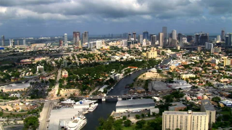 Flying east along Miami River toward downtown Miami. Shot in 2007. Stock Footage