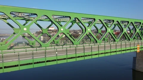 Flying by empty bridge Stary most in Bratislava, only one person running Stock Footage 127449791