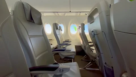 Flying in an empty plane. Empty airplane seats. Passenger airplane interior Video stock 257263783