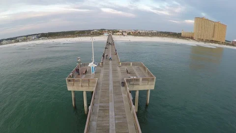 Flying from end of pier back to the beach. Stock Footage 90563492