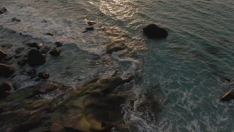 Flying Face Down Over Uttakleiv Beach Tilting Up Towards the Sun In Lofoten Stock Footage 116358845