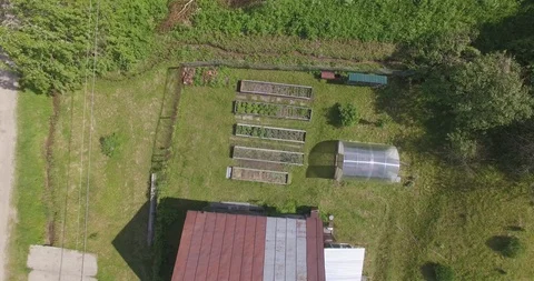 Flying face down over village houses 스톡 동영상 108747125