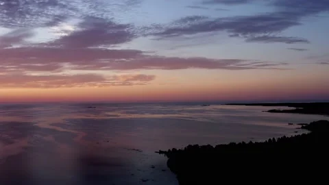 Flying Fast &amp; High with Drone Over Lake Huron Coast during Spectacular Sunset Stock Footage 137672175