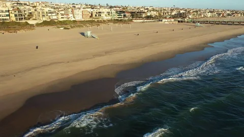 Flying fast over empty california beaches during pandemic at sunset Video stock 127610172