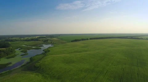 Flying Fast Over Fields and River 스톡 동영상 58800109
