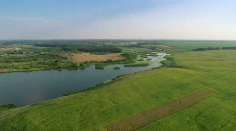 Flying Fast Over Fields and River Vídeos de archivo 58800258