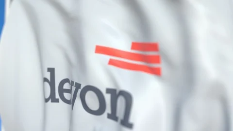 Flying flag with Devon Energy logo, close-up. Editorial loopable 3D animation Stock Footage 115077945