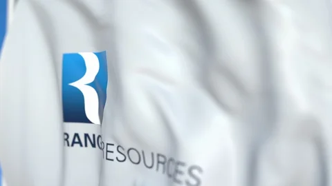 Flying flag with Range Resources logo, close-up. Editorial loopable 3D animation Stock Footage 115599874