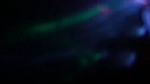 Flying flashes and stripes of light in different colors Stock Footage 106586687