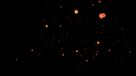 Flying Flickering Fire Ember Particles shot on black background. Stock Footage 129894328