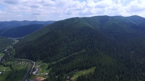 Flying from the forest over spring mountains in Ukraine Stock Footage 118388293