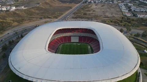 Flying forward above Akron Stadium showing full arena structure in Guadalajara Stock Footage 319677185