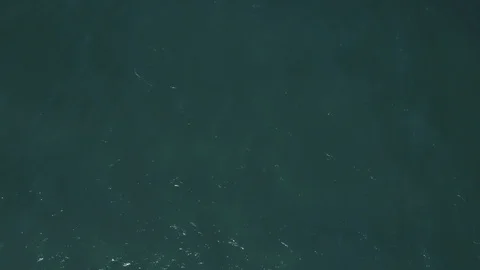 Flying forward above white anchored yacht in blue turquoise sea Stock Footage 86513532