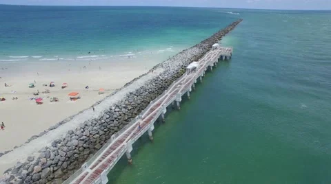 Flying Forward Along South Pointe Pier in 4K Stock Footage 64952964