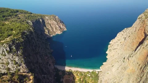 Flying forward and tilting over beautiful Butterfly Valley Stock Footage 169445293