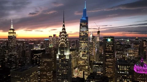 Flying Forward Between the Chrysler and One Vanderbilt at Night Stock Footage 345291069