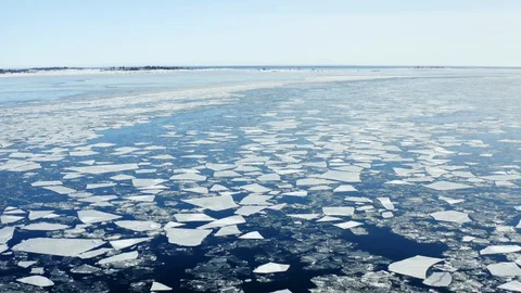 Flying forward over Baltic sea with floating ice floes, Holmsund locality Stock Footage 128660698