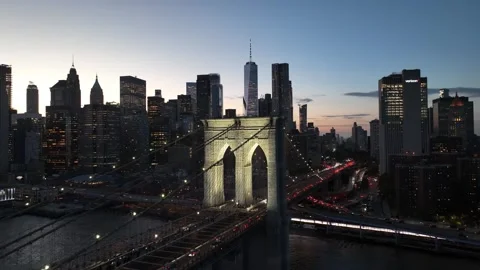 Flying Forward Over the Brooklyn Bridge Into the Lit Downtown Stock-Footage 345290235
