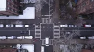 Flying Forwards Over Snow Covered Trees On Brooklyn Street Stock Footage