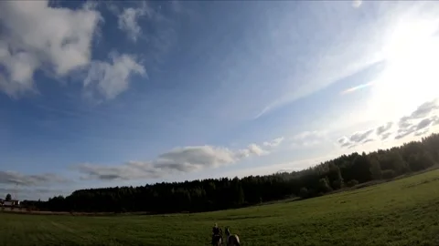 Flying on an fpv drone behind a horse, a girl on a horse Stock Footage 166832109