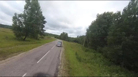 Flying fpv drone behind two cars Stock Footage 208617507
