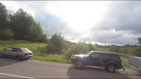 Flying fpv drone behind two cars Stock Footage 208617545