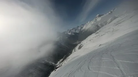 Flying on an FPV drone in the mountains Stock Footage 234379759