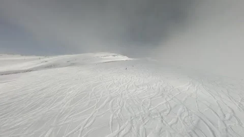 Flying on an FPV drone in the mountains in winter Stock Footage 234379725