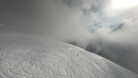 Flying on an FPV drone in the mountains in winter Stock Footage 234379729