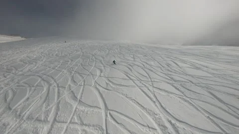 Flying on an FPV drone in the mountains in winter Stock Footage 234379730