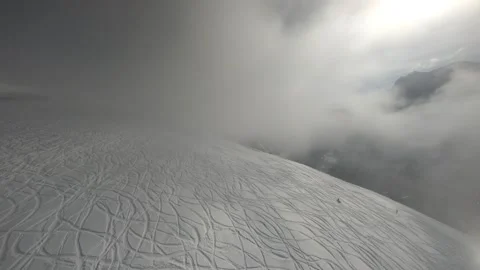 Flying on an FPV drone in the mountains in winter Stock Footage 234379757